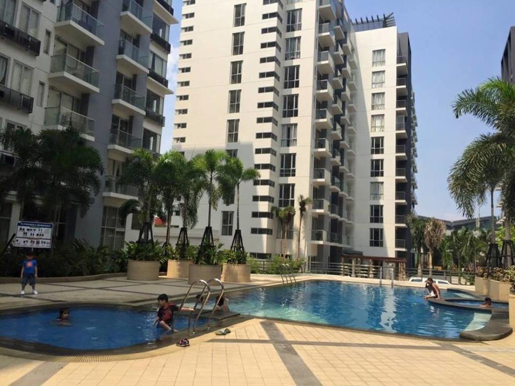 One Palm Tree Condo Маніла Номер фото